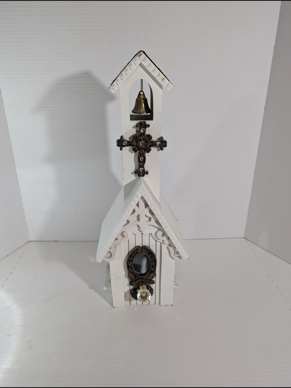 White Decorative Church Wall Accent with Bronze Cross and Bell